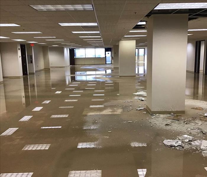Standing water in big office space.